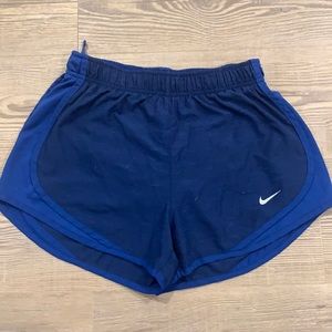 Blue Nike running shorts
